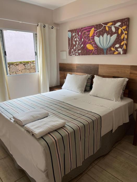 velinn pousada iguana azul