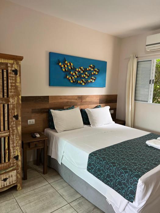 velinn pousada iguana azul