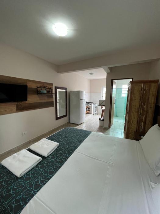 velinn pousada iguana azul