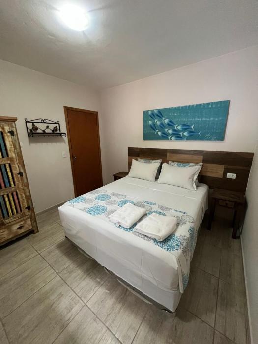 velinn pousada iguana azul