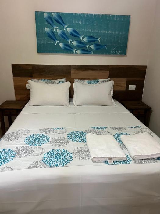 velinn pousada iguana azul