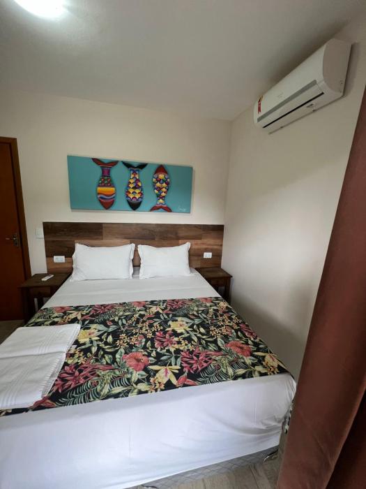 velinn pousada iguana azul