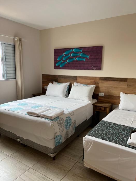 velinn pousada iguana azul