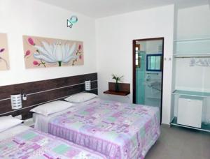 velinn pousada iguana azul