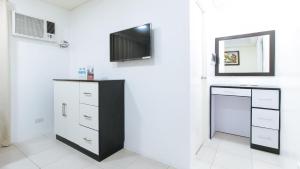 reddoorz plus evangelista street makati