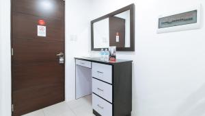 reddoorz plus evangelista street makati