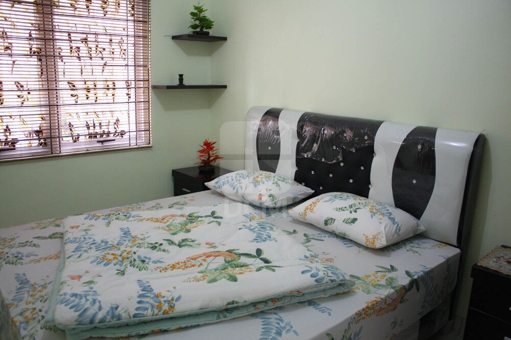 villa kota bunga peony
