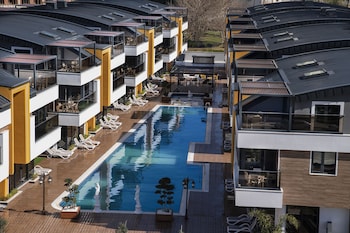 elysium green suites