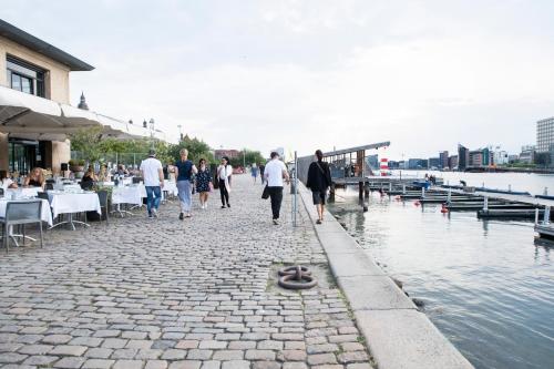 by the pier apartments into this place