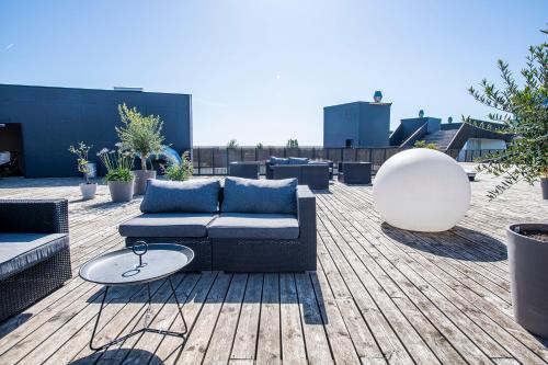 by the pier apartments into this place