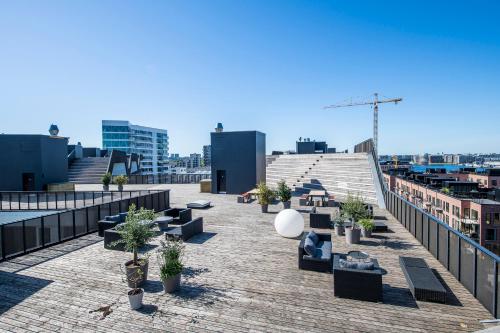 by the pier apartments into this place