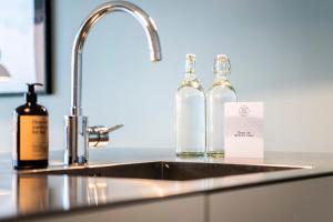 by the pier apartments into this place