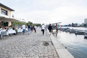 by the pier apartments into this place