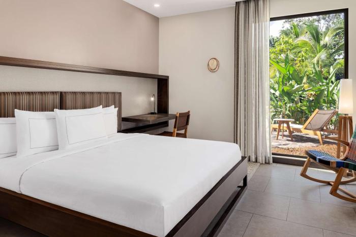 botanika osa peninsula resort curio collection by hilton