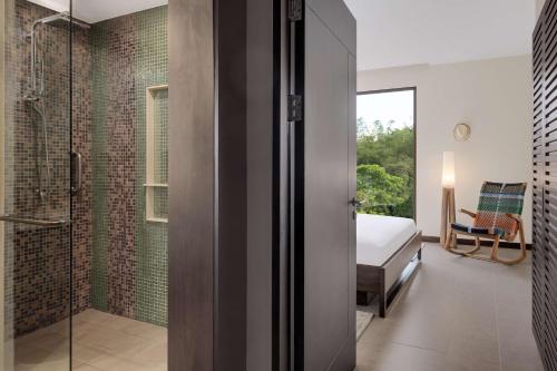 botanika osa peninsula resort curio collection by hilton