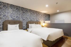 brown dot hotel minam