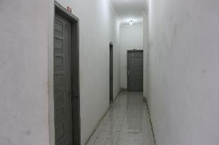 penginapan transit tomato