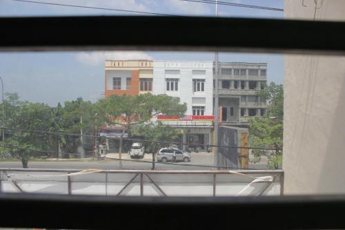 penginapan transit tomato