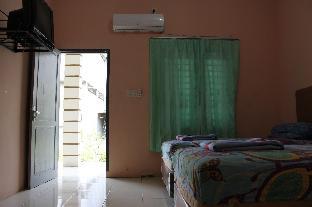 penginapan transit tomato