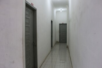 penginapan transit tomato