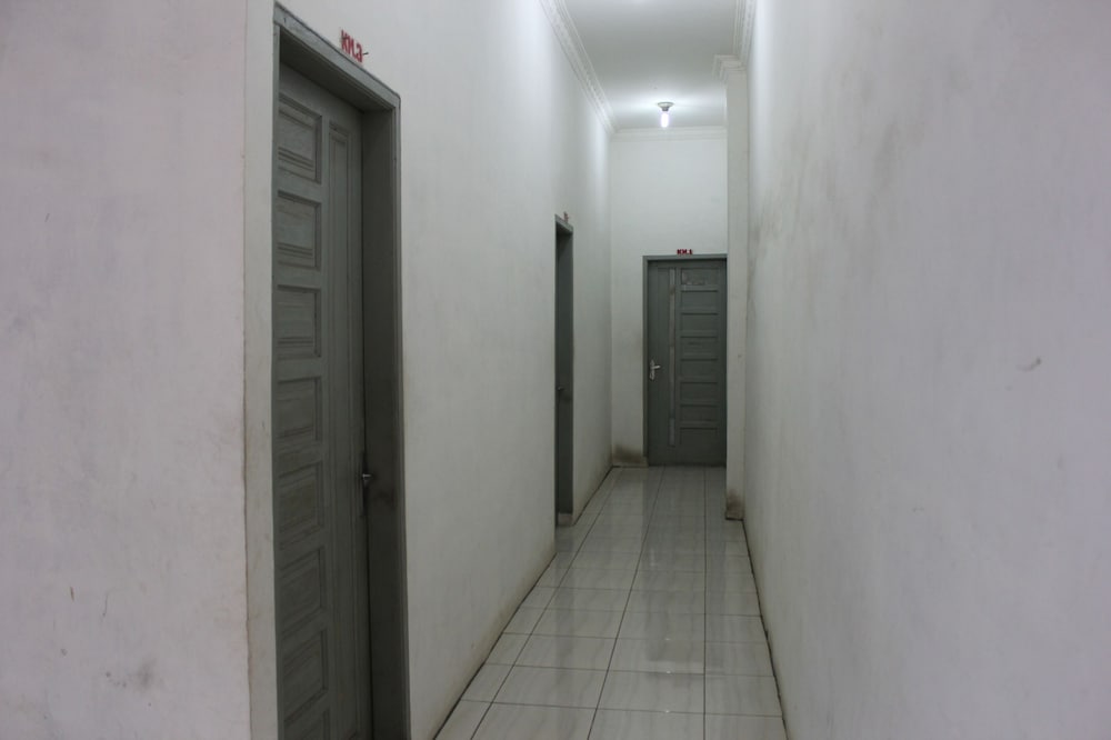 penginapan transit tomato