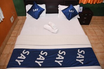 say rooms trip manager guest house