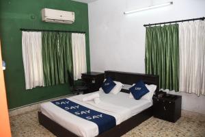 say rooms trip manager guest house