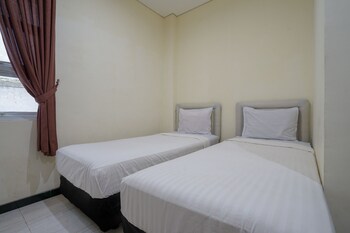 spot on 2246 kost 97 syariah