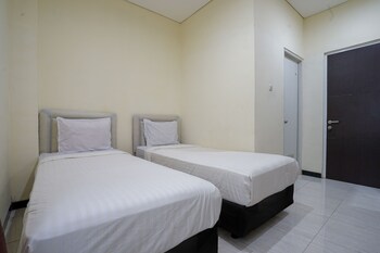 spot on 2246 kost 97 syariah