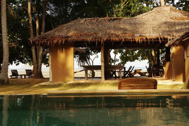 melinas beach front bungalow