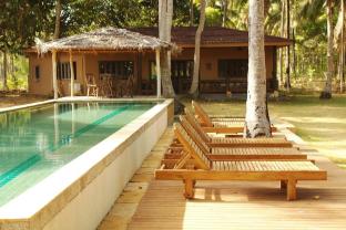 melinas beach front bungalow