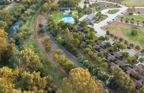 the village jordan riverside travel hotel