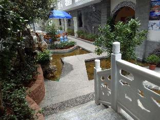 7days inn old town of lijiang the grand water wheel