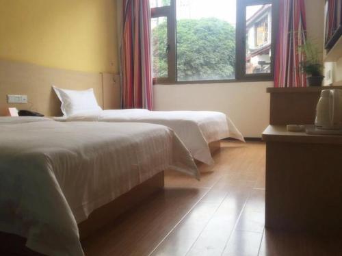 7days inn old town of lijiang the grand water wheel