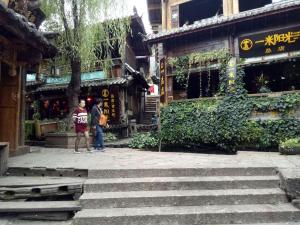 7days inn old town of lijiang the grand water wheel