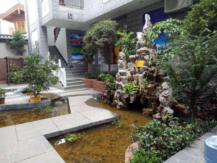 7days inn old town of lijiang the grand water wheel