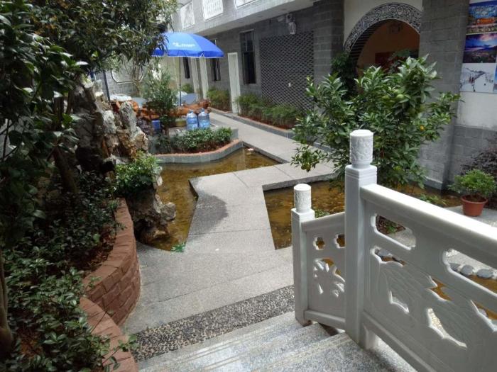 7days inn old town of lijiang the grand water wheel