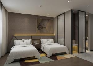 iu hotel qingdao development zone jinshatan