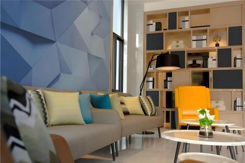 echarm hotel kunming haitun road economic management college