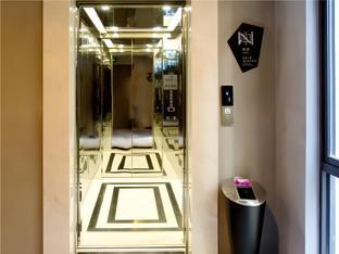 echarm hotel kunming haitun road economic management college