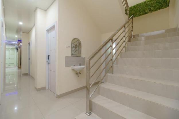 reddoorz plus near rs rk charitas 2 palembang