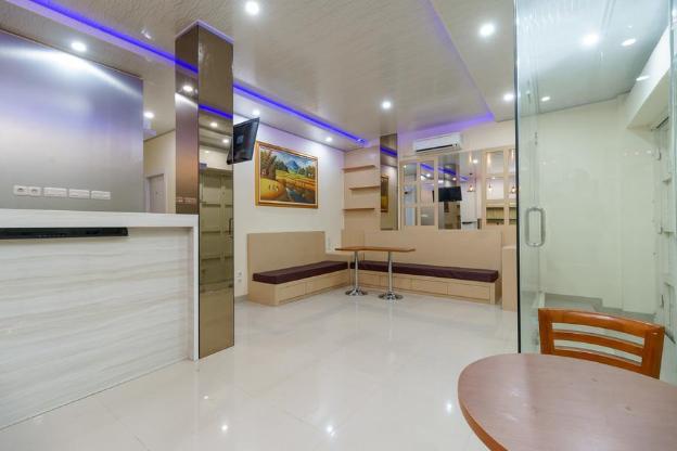 reddoorz plus near rs rk charitas 2 palembang
