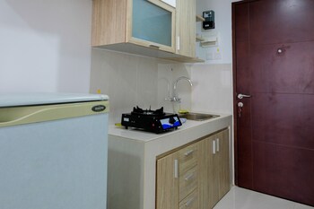 cozy studio room apartment at springwood residence