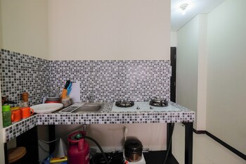 garden view studio at nifarro park apartment