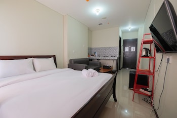 garden view studio at nifarro park apartment