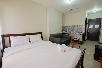 garden view studio at nifarro park apartment