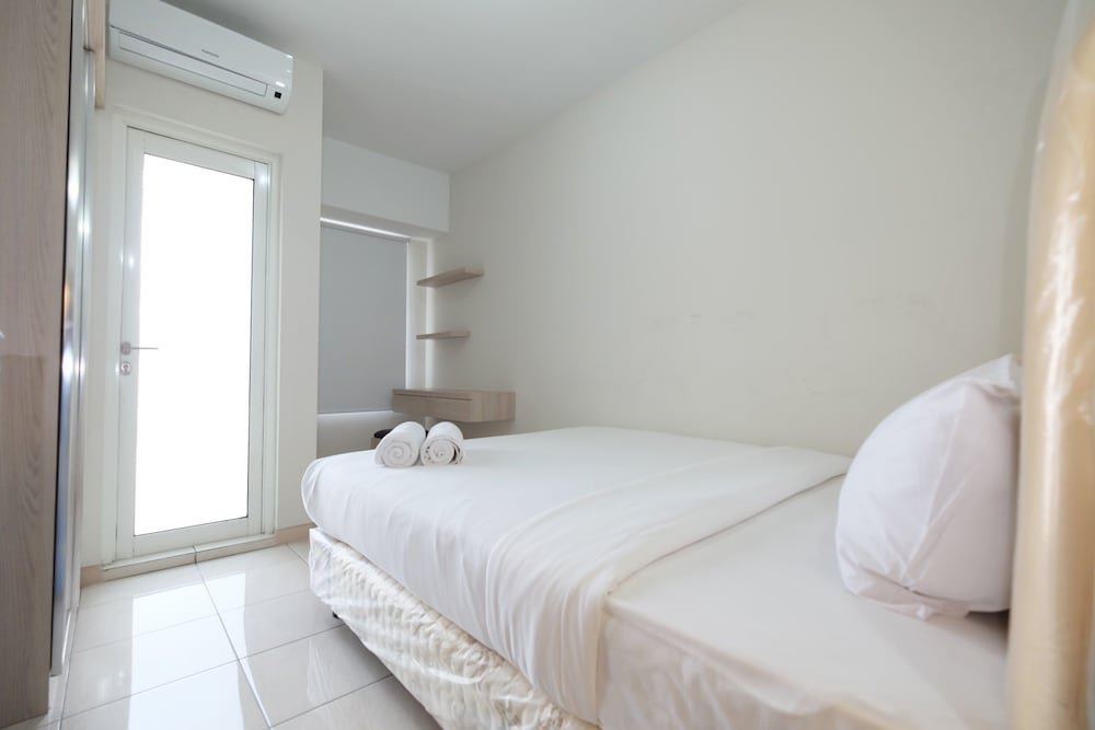 minimalist studio room at the springlake apartment sumarecon bekasi