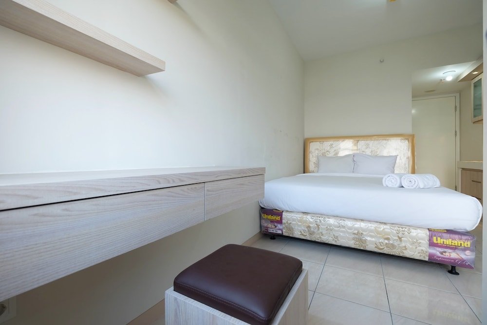 minimalist studio room at the springlake apartment sumarecon bekasi