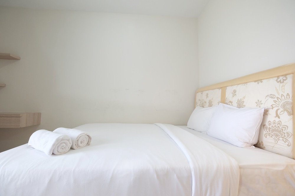 minimalist studio room at the springlake apartment sumarecon bekasi