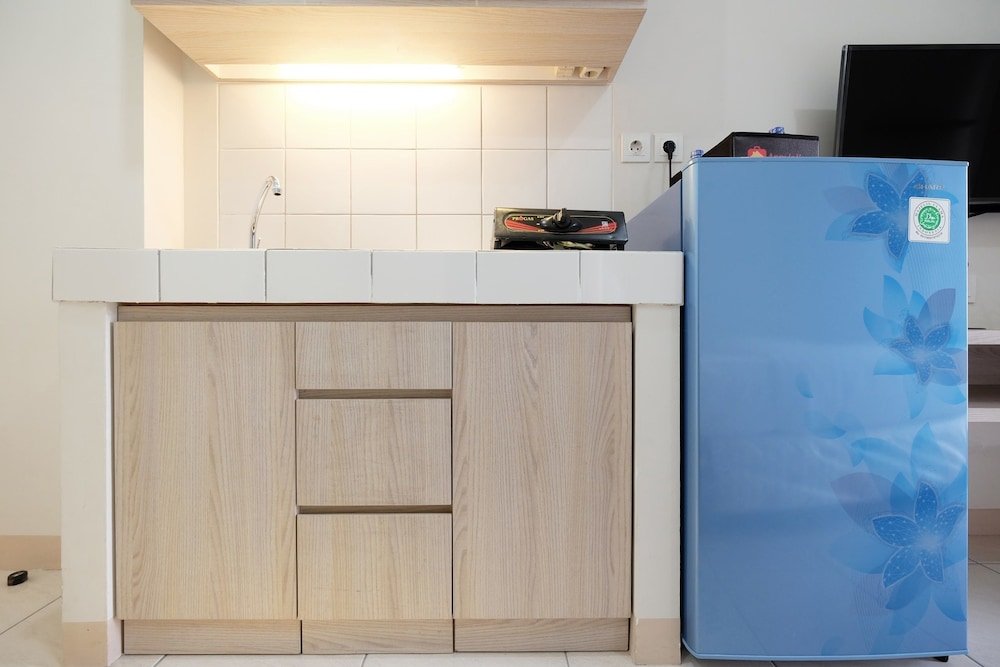 minimalist studio room at the springlake apartment sumarecon bekasi